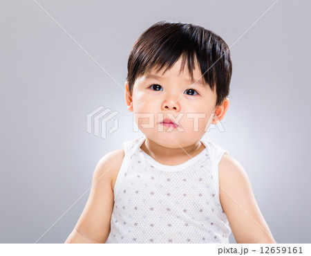 Serious baby boy 12659161