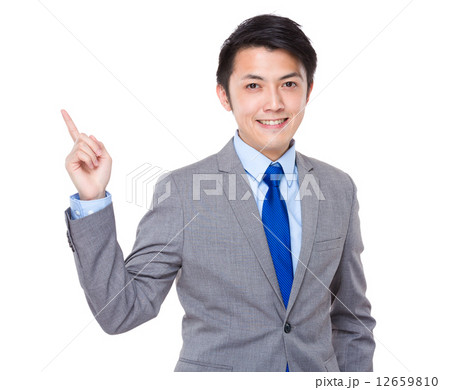 Businessman finger point up 12659810