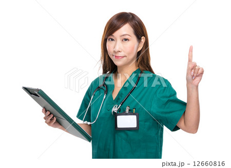 Asian female doctor with clipboard and finger up Asian female doctor with clipboard and finger up 12660816
