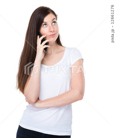 Woman talk to cellphone Woman talk to cellphone 12661276
