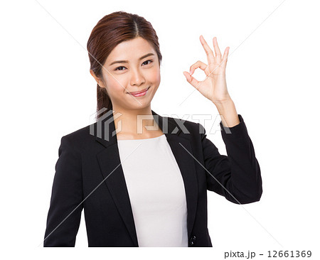 Businesswoman with ok sign 12661369