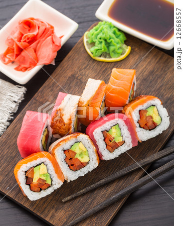 Rainbow sushi roll with salmon, tuna and eel Rainbow sushi roll with salmon, tuna and eel 12668557