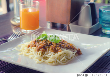 Pasta with tomato sauce basil and grated parmesan 12673021