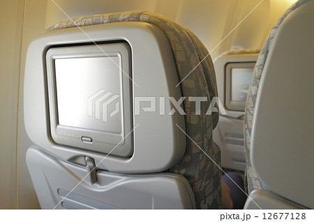 LCD screen in airplane seat LCD screen in airplane seat 12677128