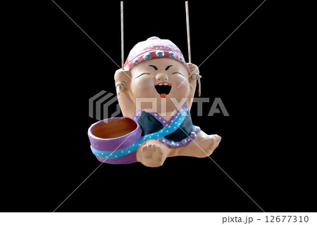 an isolate clay doll 12677310