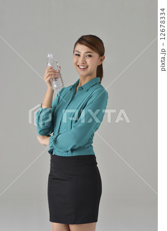 Asian Lady with bottle water 12678334