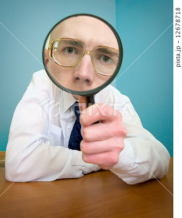 Funny people with a magnifier Funny people with a magnifier 12678718