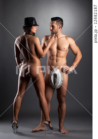 Striptease dancers posing nude in studio 12682187