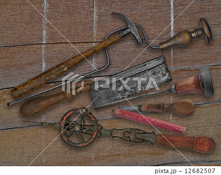 vintage woodworking tools over drift wood 12682507