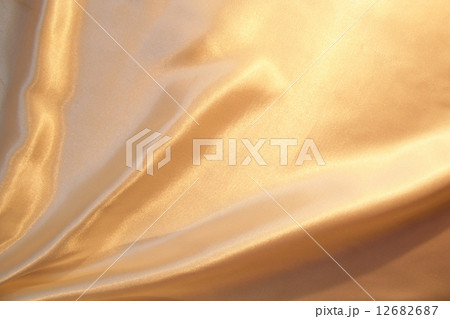 Smooth elegant gold satin as background Smooth elegant gold satin as background 12682687