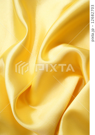 Smooth elegant golden silk can use as background Smooth elegant golden silk can use as background 12682703