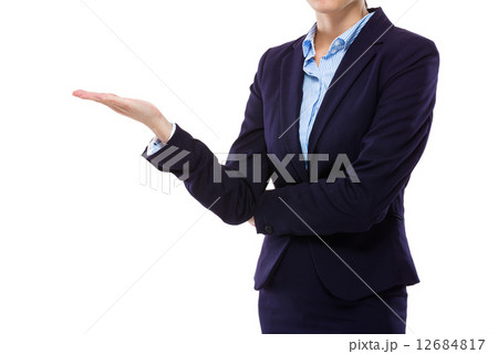 Businesswoman with hand showing blank sign 12684817