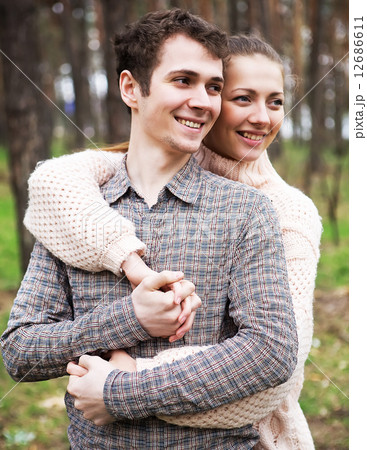 young couple in love outdoors on a sunny day young couple in love outdoors on a sunny day 12686611