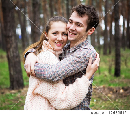 young couple in love outdoors on a sunny day young couple in love outdoors on a sunny day 12686612
