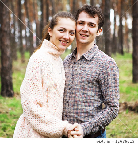 young couple in love outdoors on a sunny day young couple in love outdoors on a sunny day 12686615