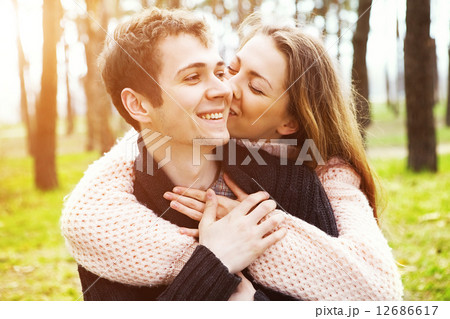 young couple in love outdoors on a sunny day young couple in love outdoors on a sunny day 12686617