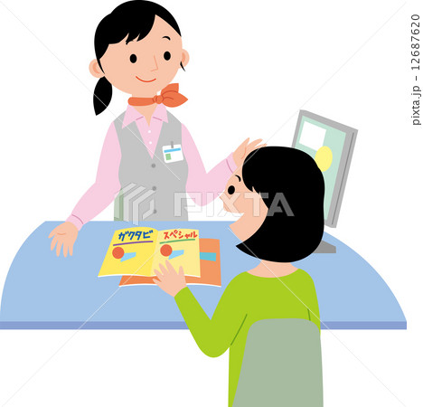 旅行代理店で相談する女子学生 12687620