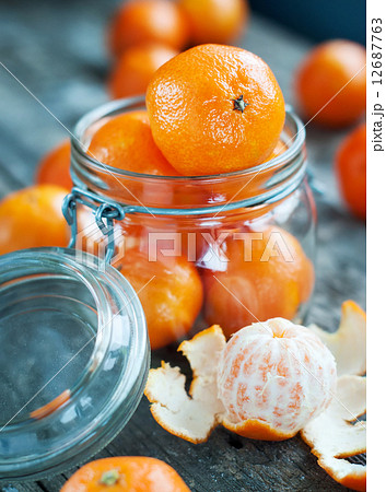 Composition with Tangerines in a Jar 12687763