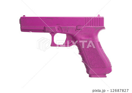 Dirty pink training gun isolated on white Dirty pink training gun isolated on white 12687827