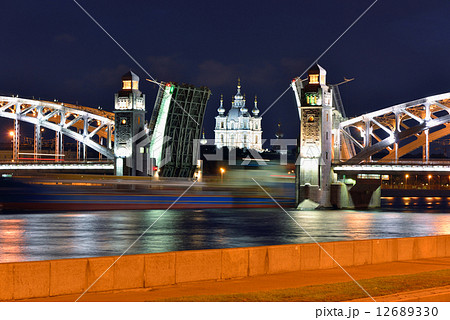 Smolniy cathedral and movable bridge in St-Petersburg Smolniy cathedral and movable bridge in St-Petersburg 12689330