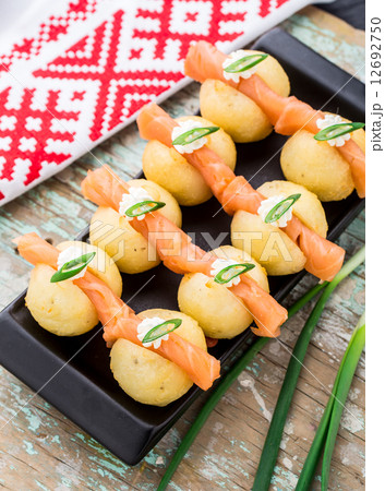 Potato gnocchi with salmon 12692750