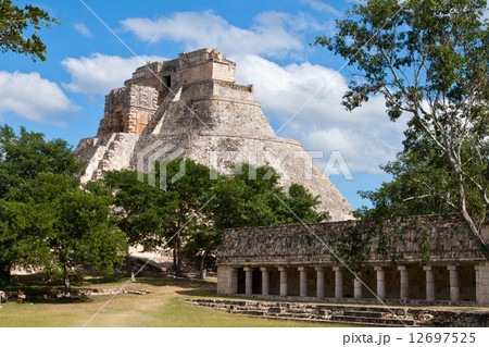 Mayan pyramid (Pyramid of the Magician, Adivino) in Uxmal, Mexic Mayan pyramid (Pyramid of the Magician, Adivino) in Uxmal, Mexic 12697525