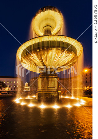 Fountain in the Geschwister-Scholl-Platz in the evening. Munich, Fountain in the Geschwister-Scholl-Platz in the evening. Munich, 12697801