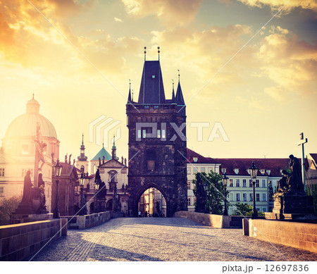 Charles bridge tower in Prague on sunrise Charles bridge tower in Prague on sunrise 12697836