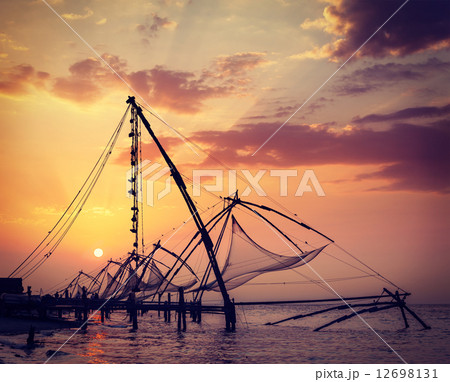 Chinese fishnets on sunset. Kochi, Kerala, India 12698131