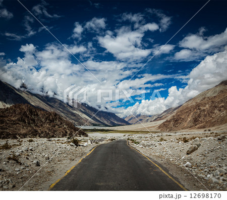 Road in Himalayan landscape in Nubra valley in Himalayas Road in Himalayan landscape in Nubra valley in Himalayas 12698170