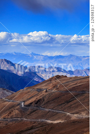 Road in Himalayas with mountains Road in Himalayas with mountains 12698317