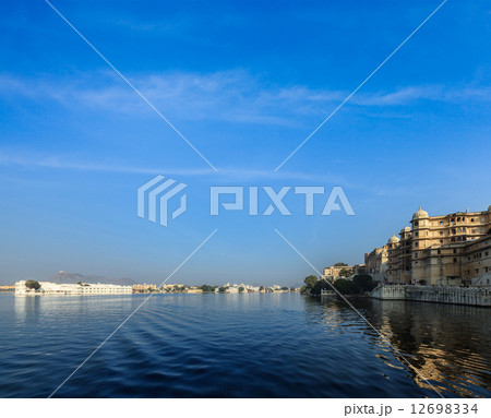 City Palace, Lake Palace and Lake Pichola. Udaipur, India City Palace, Lake Palace and Lake Pichola. Udaipur, India 12698334