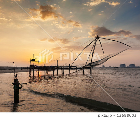 Chinese fishnets on sunset. Kochi, Kerala, India 12698603