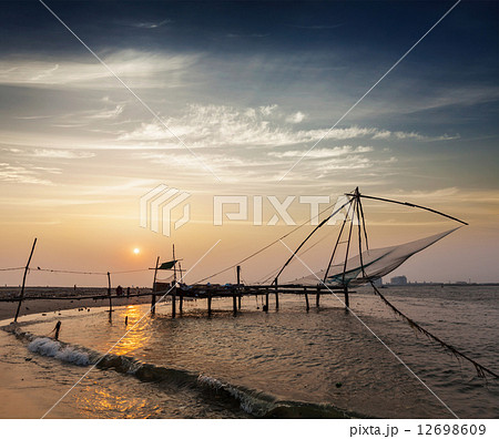 Chinese fishnets on sunset. Kochi, Kerala, India 12698609