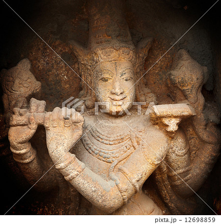 Krishna bas relief in Hindu temple. Sri Ranganathaswamy Temple. 12698859