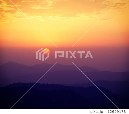 Sunset in hills Sunset in hills 12699178