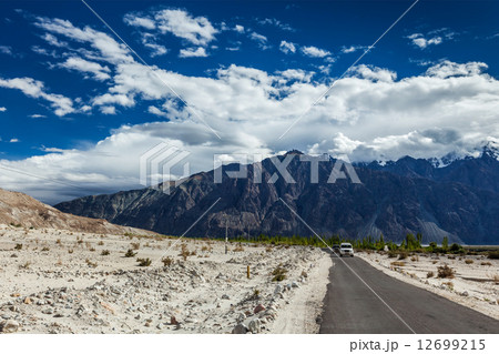 Road in Himalayas with cars 12699215