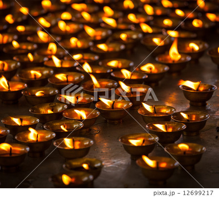 Burning candles in Buddhist temple, McLeod Ganj Burning candles in Buddhist temple, McLeod Ganj 12699217