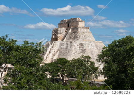Mayan pyramid (Pyramid of the Magician, Adivino) in Uxmal, Mexic Mayan pyramid (Pyramid of the Magician, Adivino) in Uxmal, Mexic 12699228