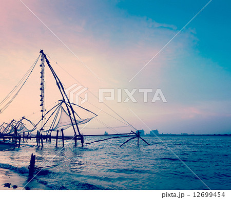 Chinese fishnets on sunset. Kochi, Kerala, India Chinese fishnets on sunset. Kochi, Kerala, India 12699454