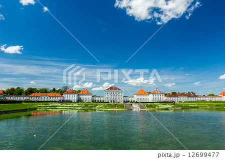 Artificial pool in front of the Nymphenburg Palace 12699477