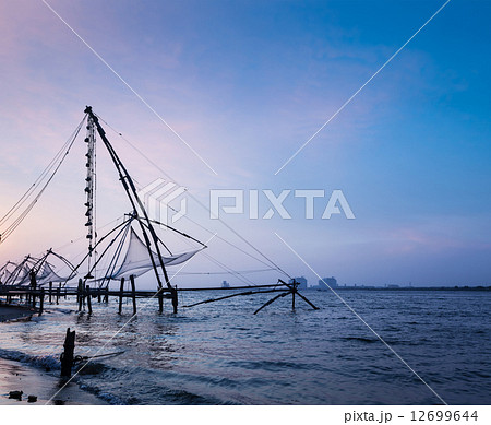 Chinese fishnets on sunset. Kochi, Kerala, India Chinese fishnets on sunset. Kochi, Kerala, India 12699644