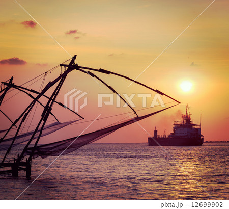 Chinese fishnets on sunset. Kochi, Kerala, India Chinese fishnets on sunset. Kochi, Kerala, India 12699902