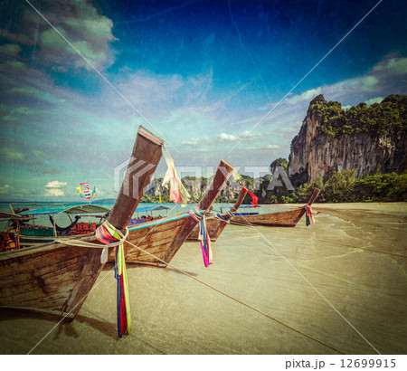 Long tail boats on beach, Thailand Long tail boats on beach, Thailand 12699915
