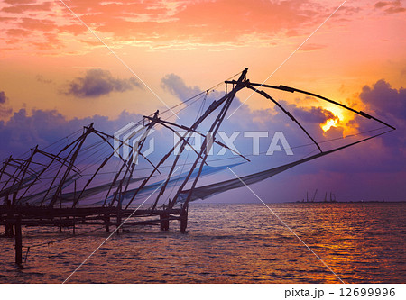 Chinese fishnets on sunset. Kochi, Kerala, India 12699996