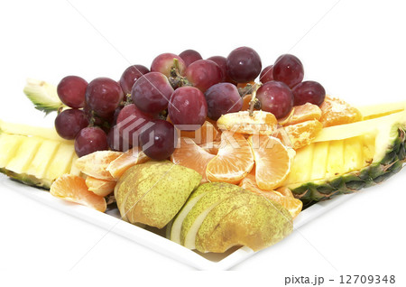 plate of ripe juicy fruit on white background plate of ripe juicy fruit on white background 12709348