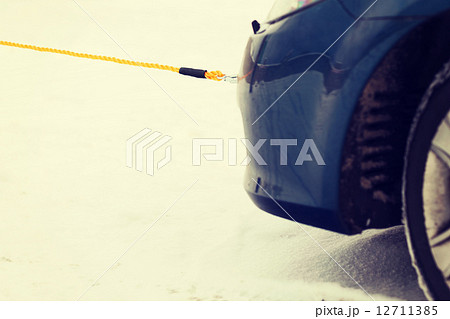 closeup of towed car with towing rope 12711385