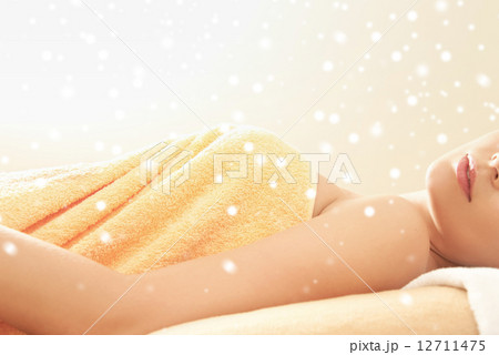 close up of beautiful young woman in towel indoors close up of beautiful young woman in towel indoors 12711475