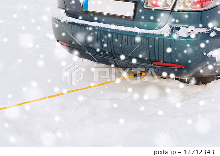 closeup of towed car with towing rope closeup of towed car with towing rope 12712343