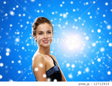 smiling woman in evening dress smiling woman in evening dress 12712914